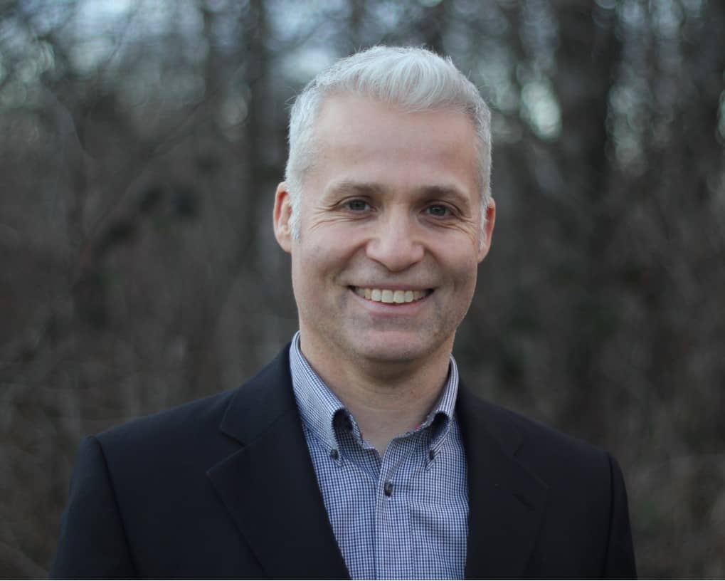 Professional headshot of Paul Hudson, a mortgage broker in Squamish, with a friendly smile and approachable demeanor.